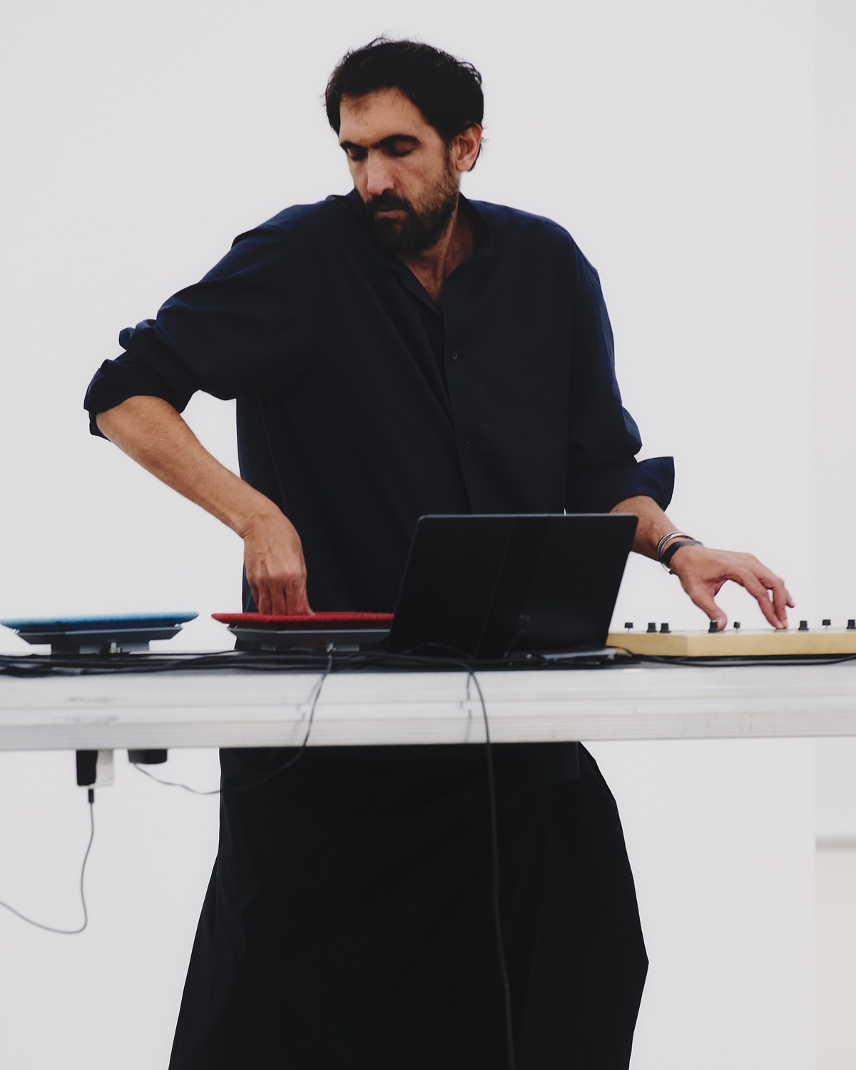Tarek Atoui performing at the Issey Miyake presentation, Centre Pompidou, Paris, October 2025. Photo © Luna Conte. Image courtesy of Tate.
